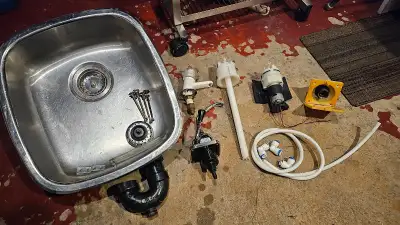 rv or van sink stainless steel 18"x16" 5" deep. with sink plugs and Mount clamps. pvc drain elbow, m...