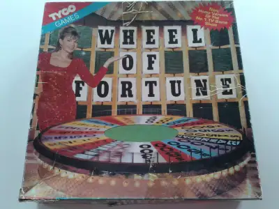 Wheel of fortune Tyco 1992 board game. Includes all 50 puzzle sheets. As shown. Missing stop arrow f...