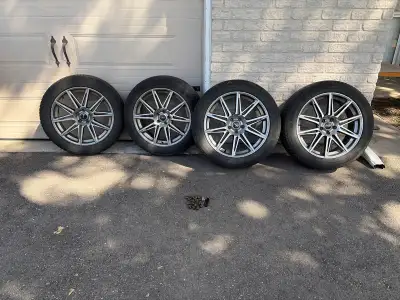 These pre-owned Fast Switch 20-inch x 8-inch alloy wheels come equipped with premium Continental Win...