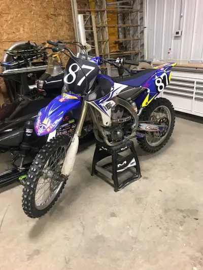 2014 yz250f 5500 cash and firm. has extra parts, ready to ride.