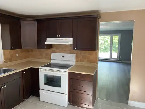 Welcome to this newly renovated beautiful side-by-side duplex offering comfort and convenience in th...