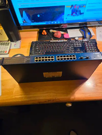 used Netgear GS7421 48 port 10/100/1000 net work switch, View more