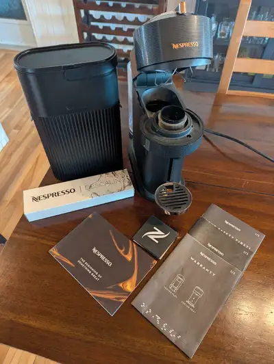 Nespresso Vertuo Next Coffee Maker with Recycling Container and Descaling Agent. Used, but in great...