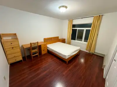 This bedroom has a queen sized bed, desk & chair. Refrigerator & microwave ensuite. Kitchen along wi...