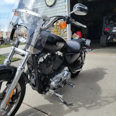 2007 Harley Davidson XL 1200L Sportster. Lots of Willie G Skull Chrome accessories. Tires are in gre...