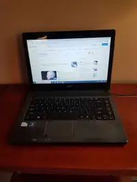 Acer laptop with Windows 10 and OfficeIntel Pentium 2.13 GHz x2