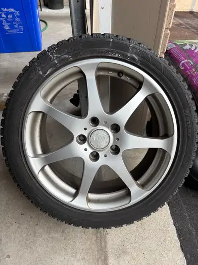 Selling a set of four (4) Sport Edition A7 wheels with winter tires. Hankook I-Pike. Used on 2006 Ma...