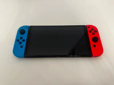 Nintendo Switch OLED Like New, View more