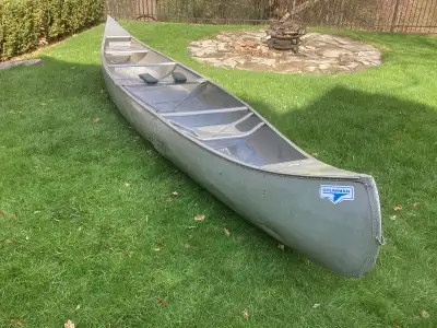 17 ft x 3 ft aluminum. Has dents but does not leak. New this canoe is around 3700 tax in.