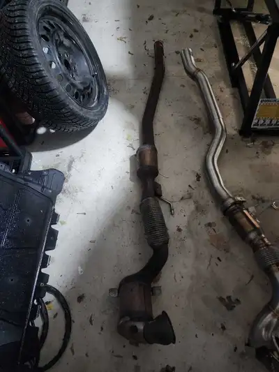 Stock cat back off a 2016 (mk7) golf r. Has 100,000 km on it. No CEL or leaks, to my knowledge it is...