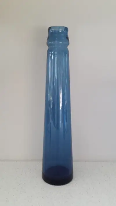 Two cobalt blue glassware items. Ikea's 14" vase (some slight water etching ). A cobalt blue votive...