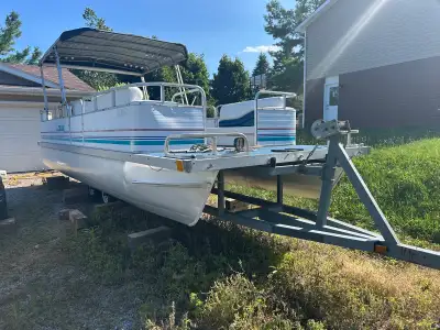 1996 24’ pontoon with 90 hp Johnson, good running condition. Has a hard top on the back and soft top...