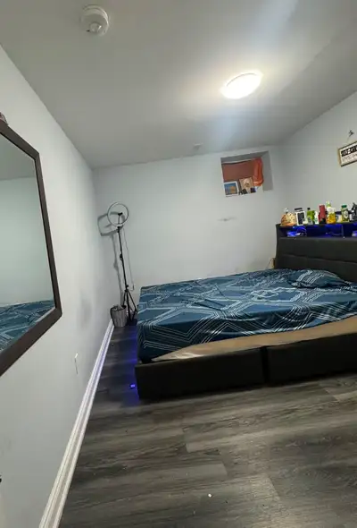 A private furnished bedroom is available for a couple in a clean and spacious 2-bedroom basement apa...