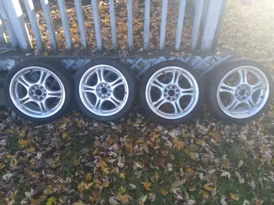 Set of 4 aluminum RX7-style 5-spoke rims with tires mounted. Japanese aftermarket wheels, JWL/VIA ce...