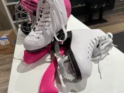 Ice skates and helmet, View more