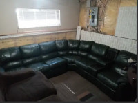Green leather sectional with recliners