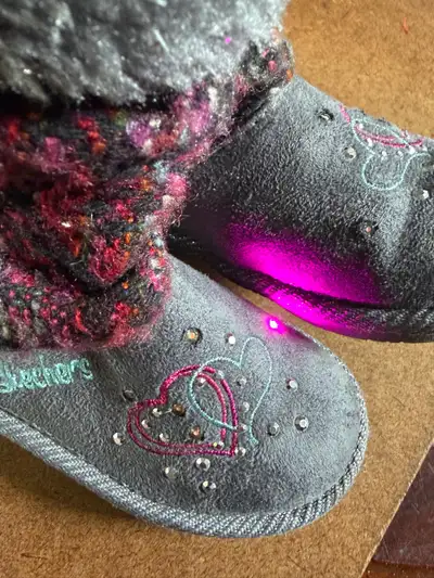 These Skechers Twinkle Toes girls' boots are in good condition and feature fun light-up detailing fo...