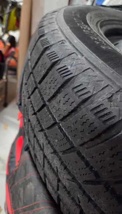 4 Goodyear Winter Command Tires on Steel Rims with sensors, good condition with tire bags and storag...