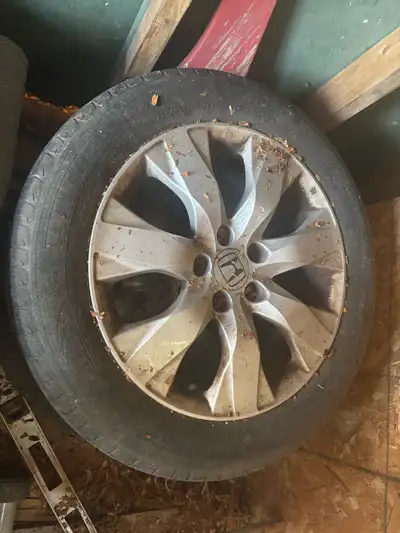 Crv rims/tires. Tire tread is low but should get one season.