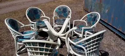 Selling 6 chairs with brand new pillows an big glass table (glass not in the picture) all handmade.