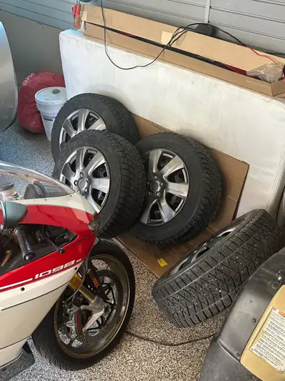 Bridgestone Blizzak VM2 winter tires: 225/65R17 mounted on straight / true steel 5 x 114.3 wheels wi...