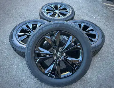 Yes it is Brand Never been mounted, Brand New OEM Original authentic Honda motos wheels and Michelin...