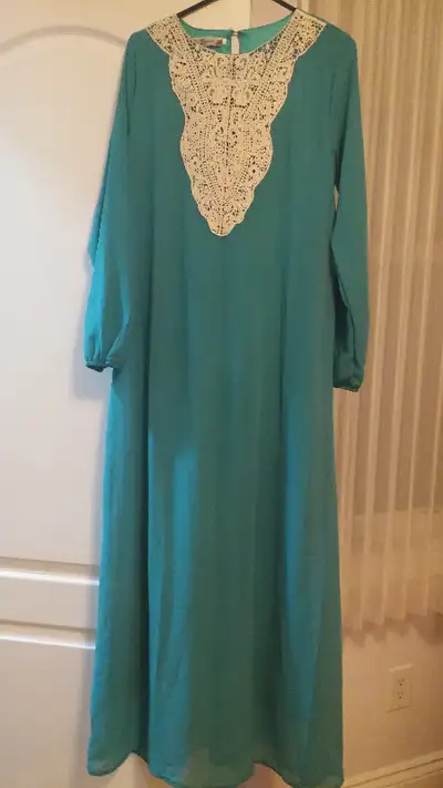 Brand new gorgeous chiffon long dress, fully lined never worn, could also fit size 12 or 14