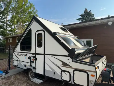 Excellent condition, can be pulled by most vehicles. Comes with solar panal, 2 propane tanks and 2 6...
