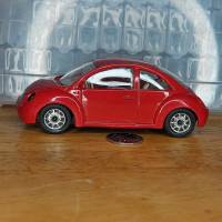 Burago Volkswagon New Beetle - 1/43 Scale - Red - $10.00