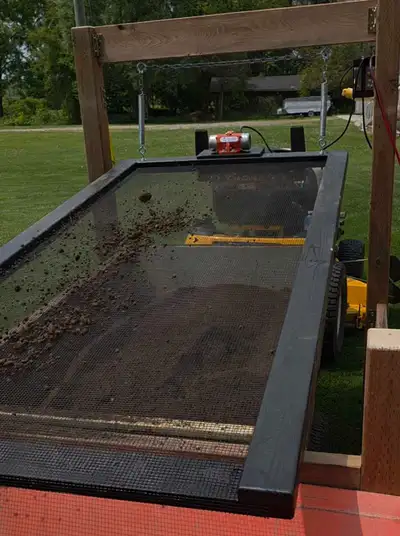 Homemade, well built dirt and compost screener with adjustable vibrating motor. 1/4 coated screen wi...