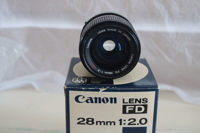 Canon FD 28mm 1:2 S.S.C lens with Canon A-1 camera. in Cameras & Camcorders in North Bay