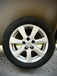 Mazda OEM Rims with Brand New Tires on
