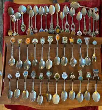 44 pieces of silver plate spoons with wooden rack for $69