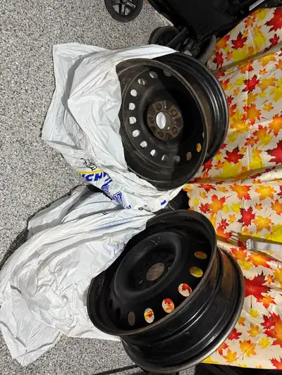 Here are 4 used black steel rims with a 5-114.3 bolt pattern, sized at 17x6.5 inches. They are in fa...