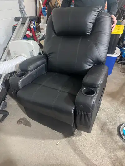 Leather massage chair and recliner. Also has heat. Has remote for all functions. 4 years old. Very c...