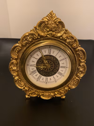 A beautiful vintage gold plated mantle clock in excellent shape and working condition. Made in Germa...