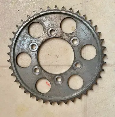 This is a used but nearly new rear sprocket of 41 teeth. 6 bolt pattern and center hole of 80 mm No...