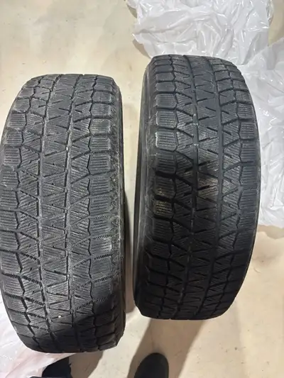 Selling 2 excellent condition winter snow tires Lots of life and threads about 75% See pictures Tire...