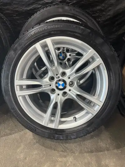 225/50/18 Continental WinterContact tires 18x8.0 OEM BMW Rims