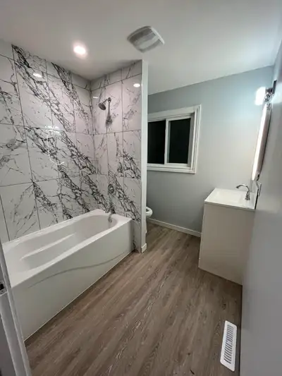 3 BDRM Main Floor Suite with Double Garage (West End)