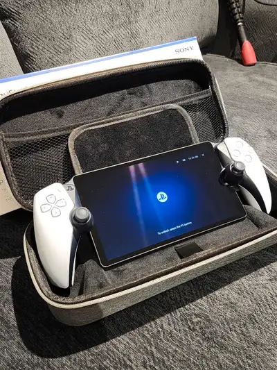 Playstation Portal with Case Purchased early December, used a few times. Most my portable gaming is...
