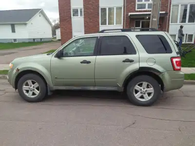 Good in gas, drives well, old SUV, rust at bottom, body needs work Quick sale