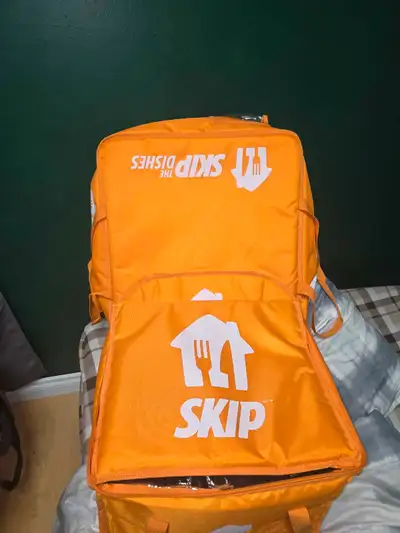 Skip delivery bags. $80 or $110 new. Orange never used. Black used. Lloydminster great condition