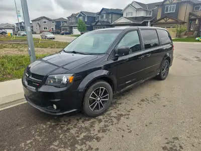 2014 Dodge Caravan. 1 owner, well maintained. Has stow and go seats, dvd player with TV for the back...
