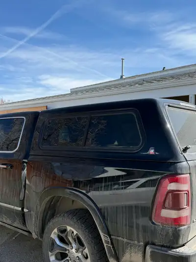 Like new Cap-It hard top canopy. Color matched for a 1500 ram limited. Sliding windows plus a window...