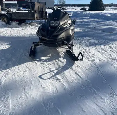 Got my old sled for sale has ownership and 2026 trail pass it runs on 2 cylinders and has a knock on...