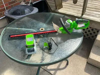Cordless Hedge Trimmer with charger, View more