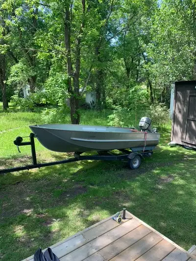 14ft Aluminum fishing boat 9.9 Honda tiller outboard (gas) utility trailer with winch Sold as a pack...