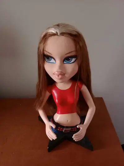 I'm selling a Bratz Head Styling Doll, a fun and stylish toy that allows for creative hairstyling an...