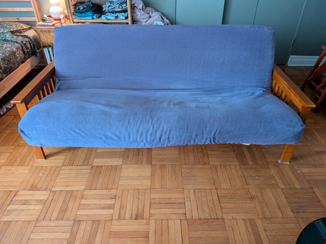 Solid Wood Double/Full size Futon includes two different covers in Couches & Futons in City of Toronto